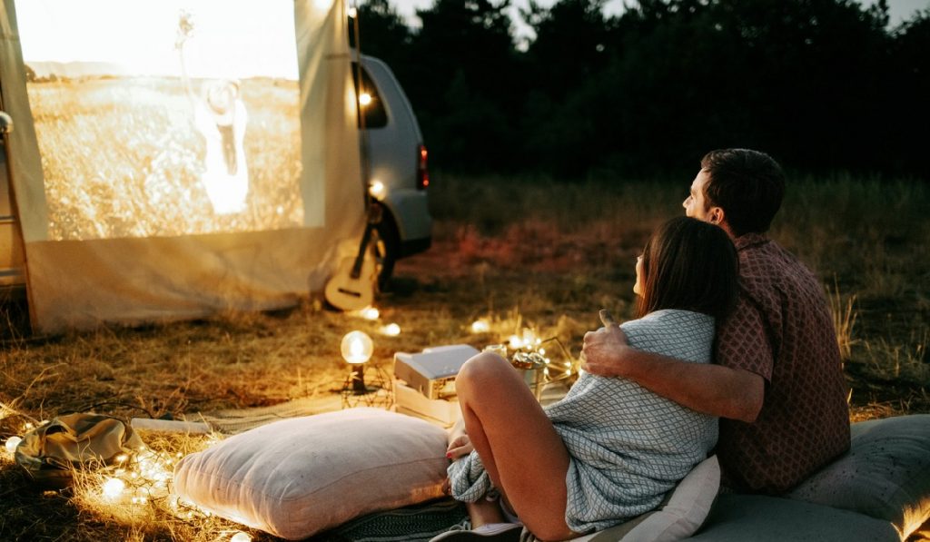 watching a movie in your backyard with an outdoor projector