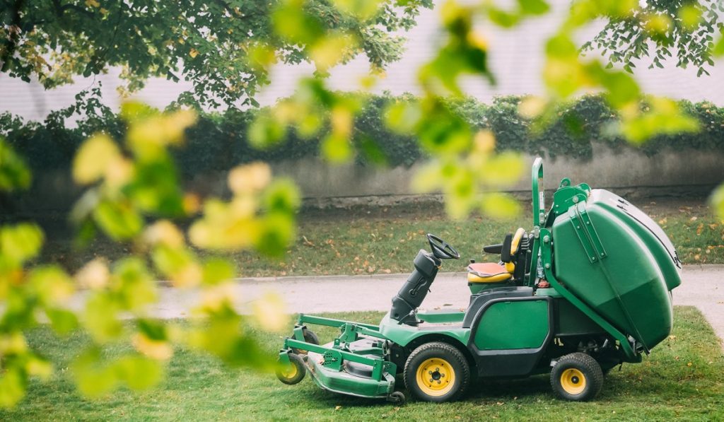Store Your Gardening Tools Properly like using a riding lawn mower cover
