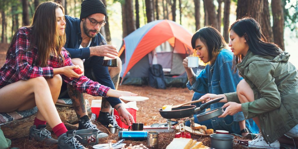 Friends camping in the forest