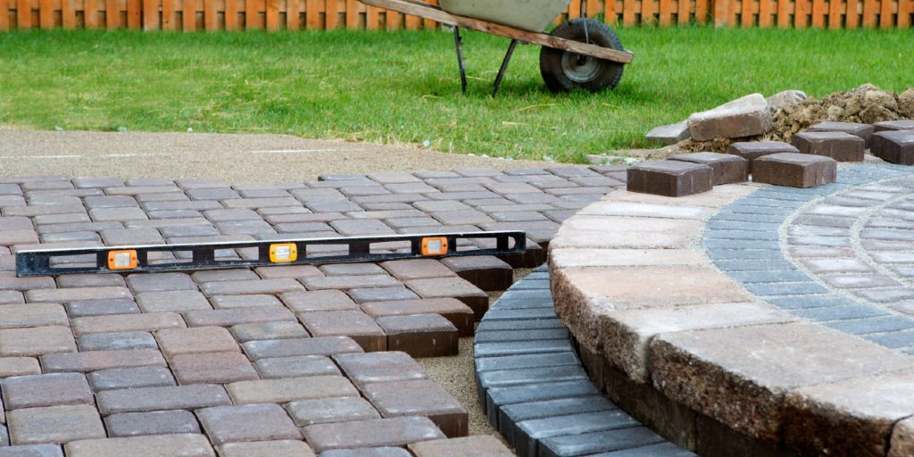 cheap-patio-ideas garden-gate Wehn building a patio prepare to use level and barrel constantly, patio island have polymeric sand layed and job completion almost done when final pavers cut and placed