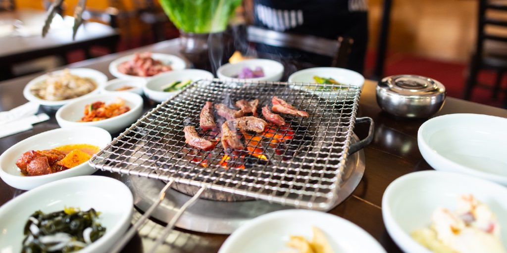 cookout-side-dishes garden-gate Korean barbecue at a korean restaurant