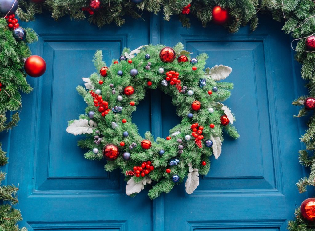 Christmas wreath on a blue door