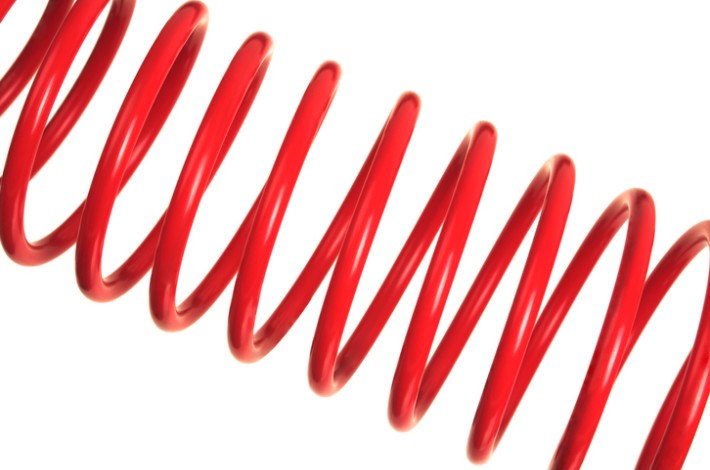 Close-up image of a red coil hose.